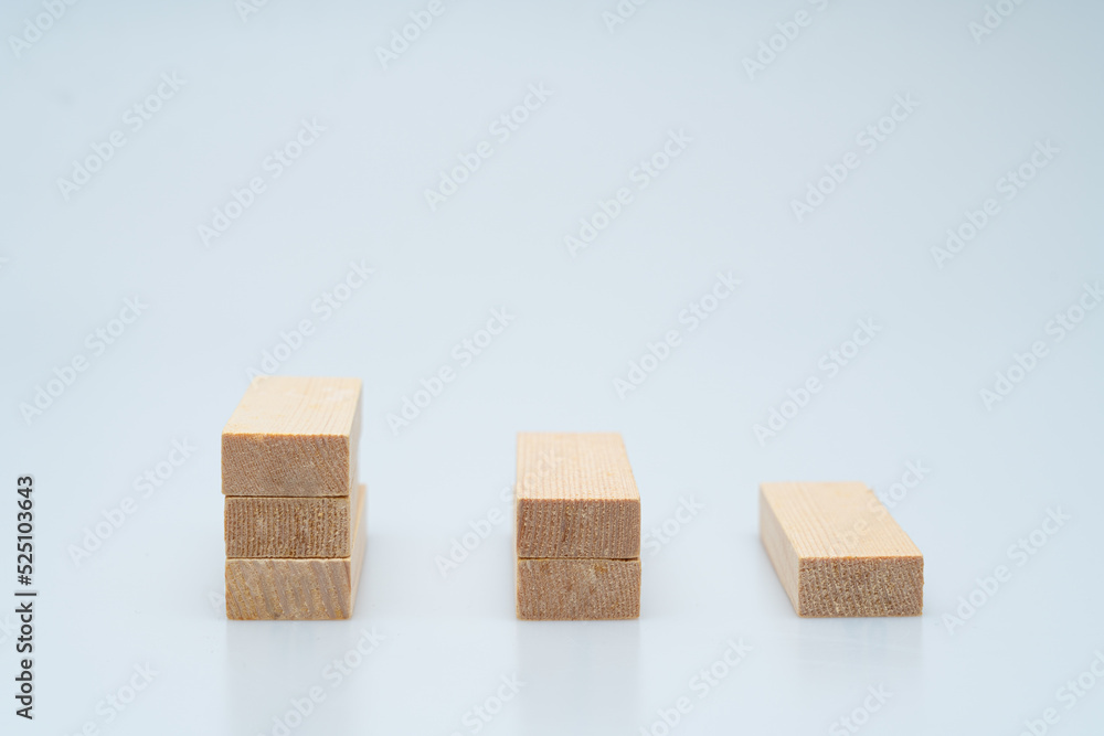 Expressing various concepts such as dominoes and business using wood jenga Expressing various concepts such as dominoes and business using wood jenga