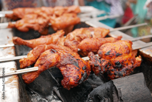BBQ chicken on grill close up 