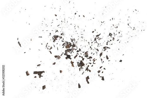 Explosion effect  burned  charred paper scraps  scattered isolated on white texture  top view