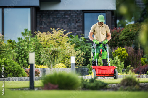 Принти на полотні Grass Fertilizing Using Push Spreader