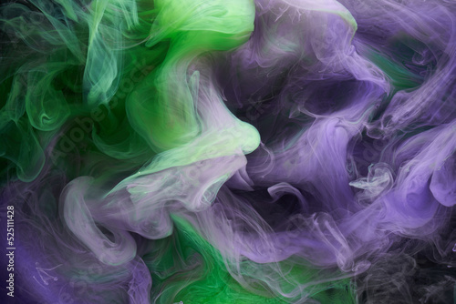 Green purple smoke abstract background, acrylic paint underwater explosion