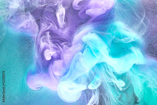 Blue multicolored smoke abstract background, acrylic paint underwater explosion