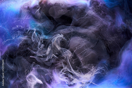 Blue black multicolored smoke abstract background, acrylic paint underwater explosion