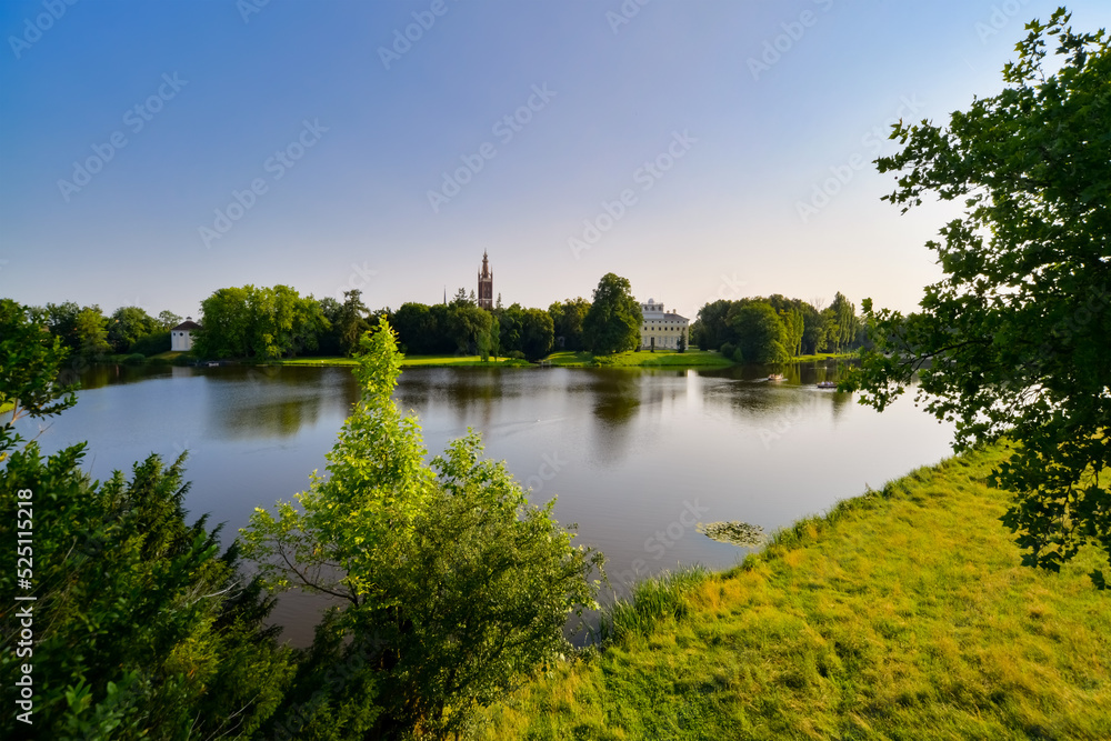 Scenic landscape panorama in “Gartenreich Dessau-Woerlitz“ Germany on sunny summer evening in warm sunlight is a public Unseco World Heritage site in Saxony-Anhalt Germany on the river Elbe.