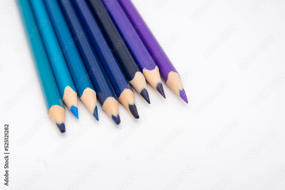 Group of colored pencils and crayons on white background. Text space. Group of colored pencils and crayons on white background. Text space.