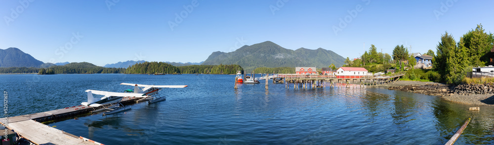 Dock and Seaplanes in the Harbour on a Sunny Afternoon on Vancouver Island. Summer Season. Tofino, British Columbia, Canada. Adventure Travel.