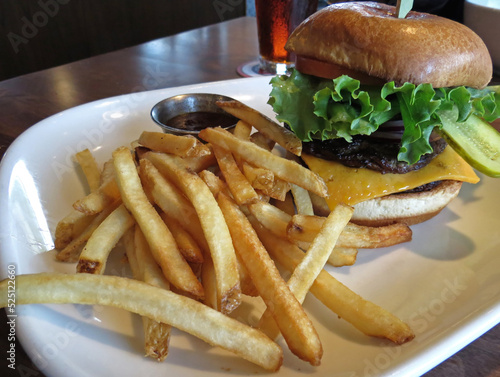 Double cheeseburger with the works, served with French fries 