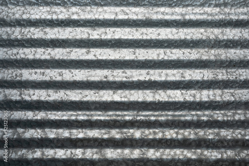 Shiny gray corrugated metal abstract background in horizontal formation