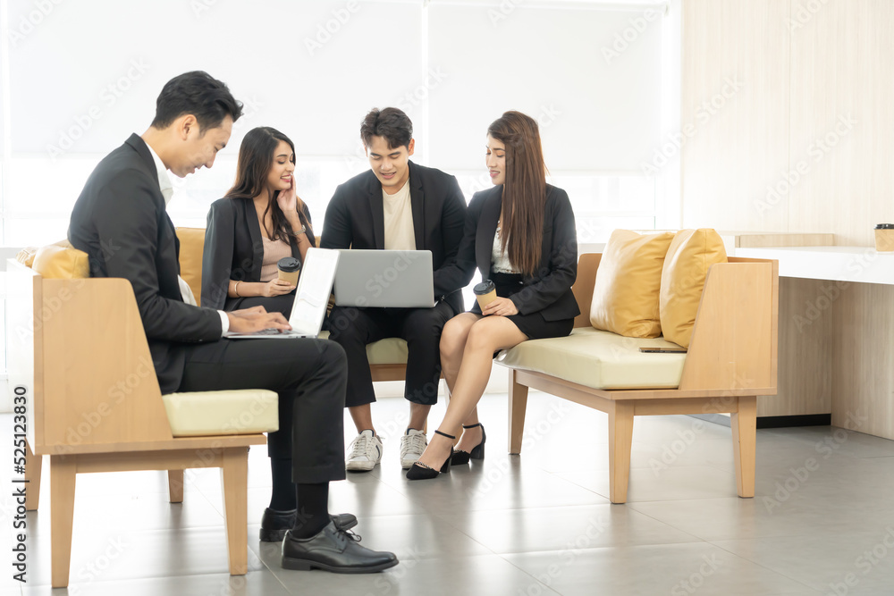Young coworkers. Young modern colleagues in smart casual wear working while spending time in the office. Business man at the office with a laptop.