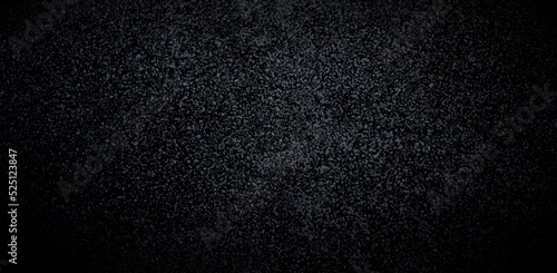 Asphalt black low textured background. Dark sanded surface.
