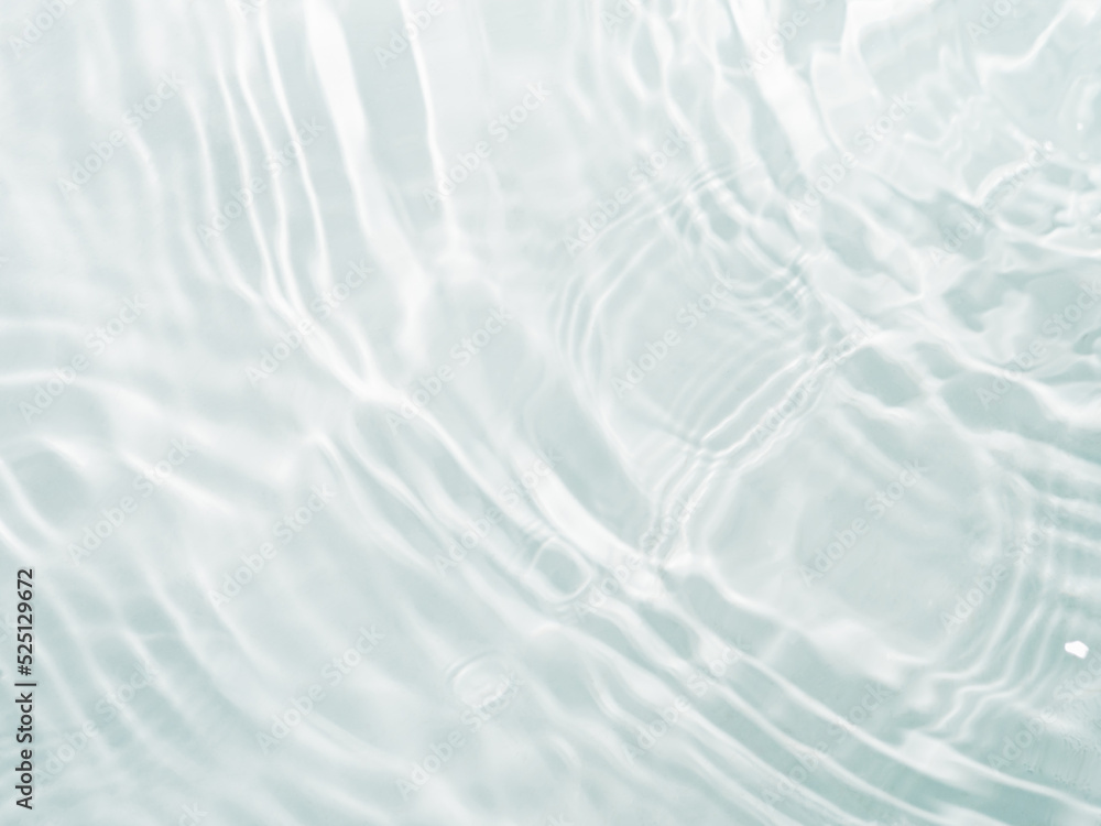 Blurred ripple water texture on white background. Shadow of water on sunlight. Mockup for product, spa or travel background. Marble water surface as wallpaper background Blurred ripple water texture on white background. Shadow of water on sunlight. Mockup for product, spa or travel background. Marble water surface as wallpaper background