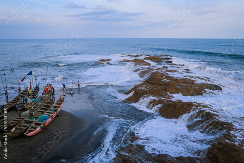 Powerful Waves of the Atlantic Ocean on the Ghana Cape Coast coastline, West Africa photo