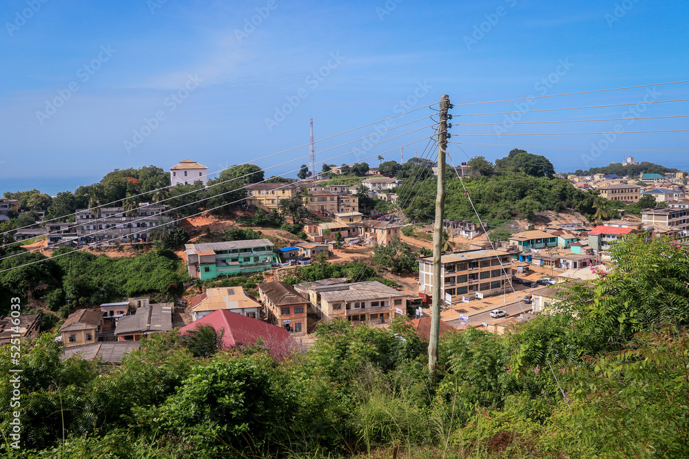 Panoramic View to the Cape Coast Downtown Houses among Green Trees in Ghana, West Africa 