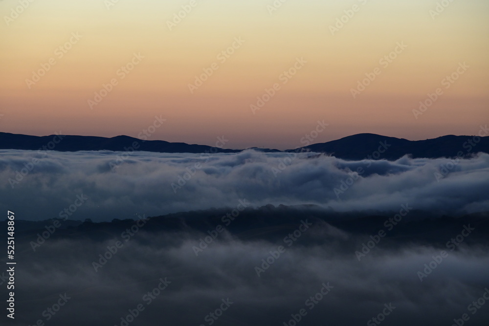 dawn over clouds