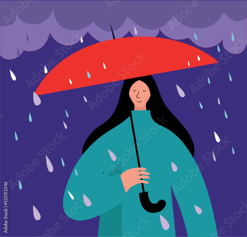 A young woman under an umbrella against the background of a dark rainy sky
