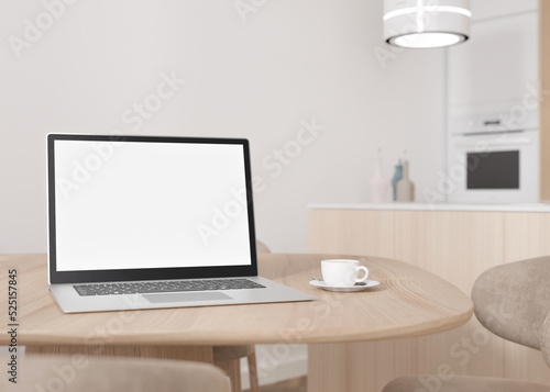 Laptop with blank white screen, on wooden table at home. Computer mock up. Free, copy space for app, game, web site presentation. Empty laptop screen ready for your design. Modern interior. 3D render.