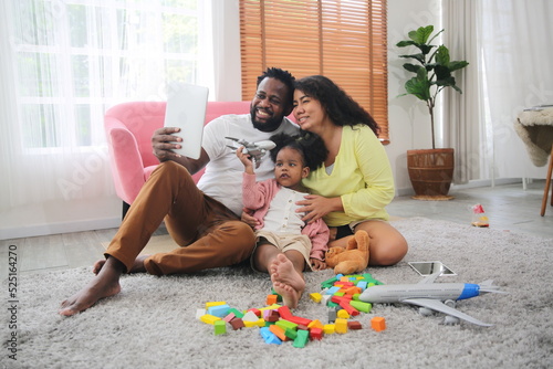 Joyful multiethnic family and their leisure at home