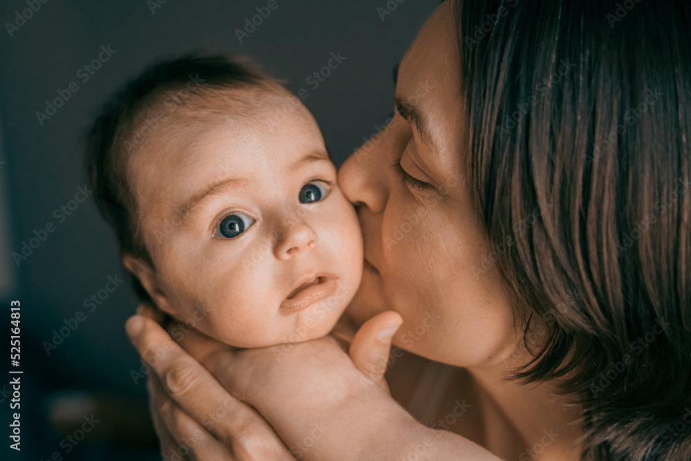Mom, mummy, young mother with little baby daughter. Mum kissing and hugging child. Newborn cute happy girl smiling in woman hands. Happiness for parents in family. Aged parents, parenting, motherhood Mom, mummy, young mother with little baby daughter. Mum kissing and hugging child. Newborn cute happy girl smiling in woman hands. Happiness for parents in family. Aged parents, parenting, motherhood