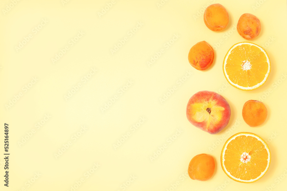Yellow summer background with tropical fruits Yellow summer background with tropical fruits