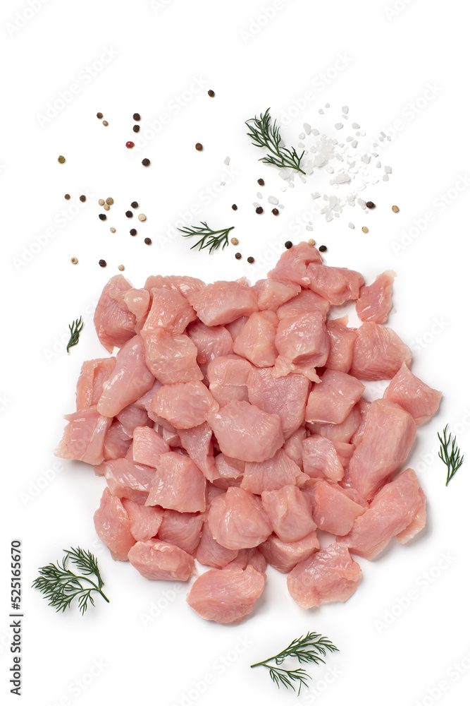 Turkey breast meat fillet sliced on pieces decorated with vegetables on white background. Top view. Turkey breast meat fillet sliced on pieces decorated with vegetables on white background. Top view.