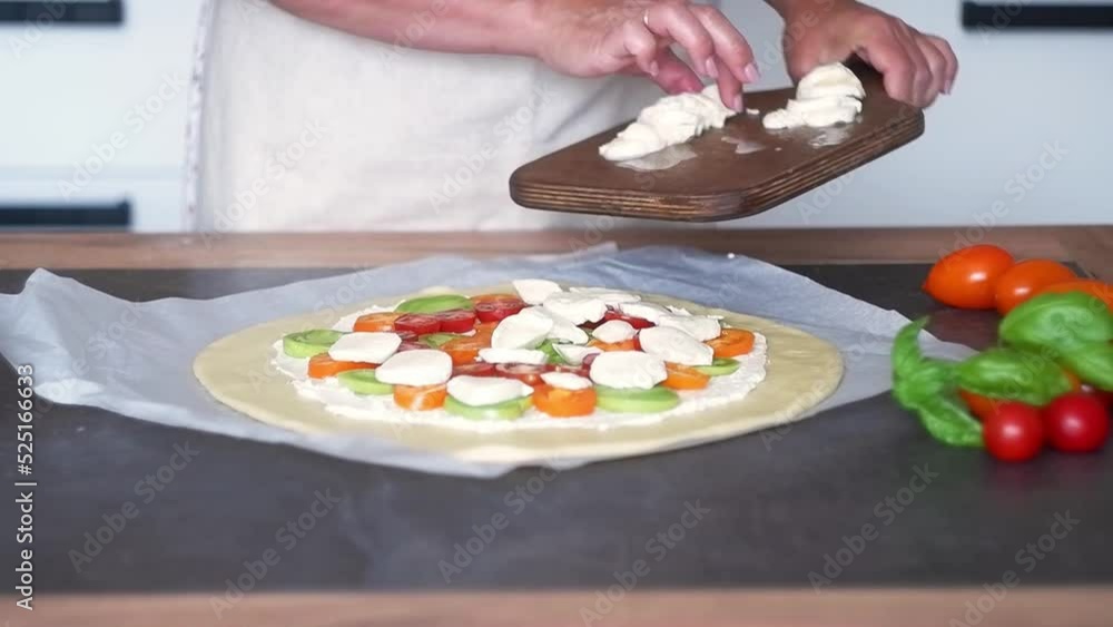person slicing a pie in the light kitchen person slicing a pie in the light kitchen