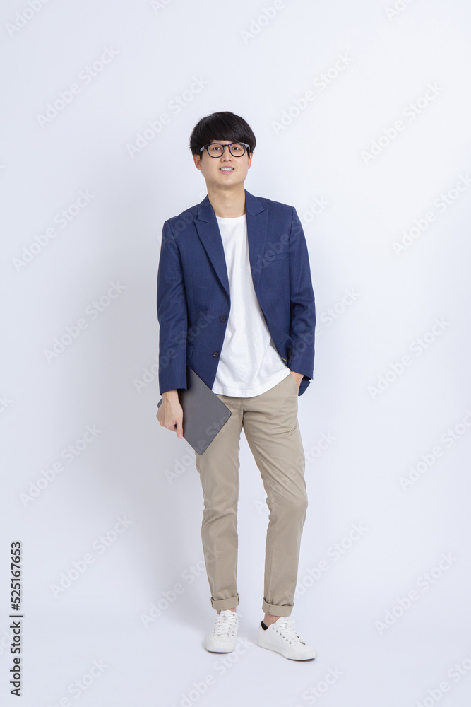 Happy young eyeglasses man with tablet computer