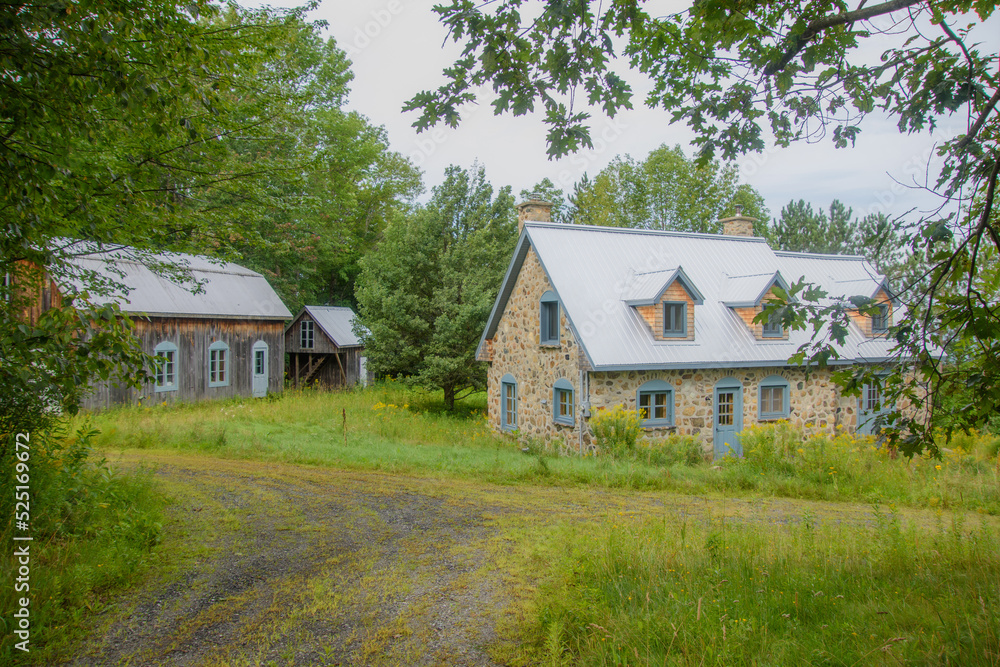 Typical architecture of a canadian house on the countryside in the province of Quebec