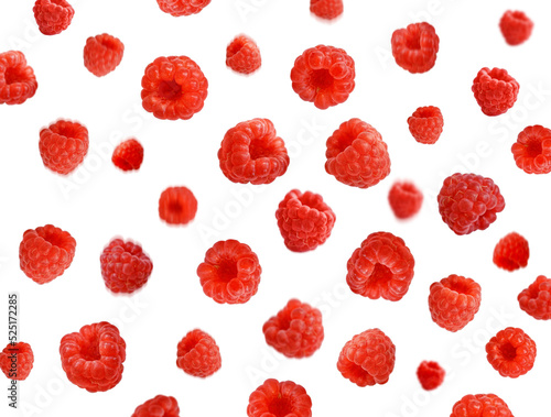 Various falling fresh ripe raspberries on white background 
