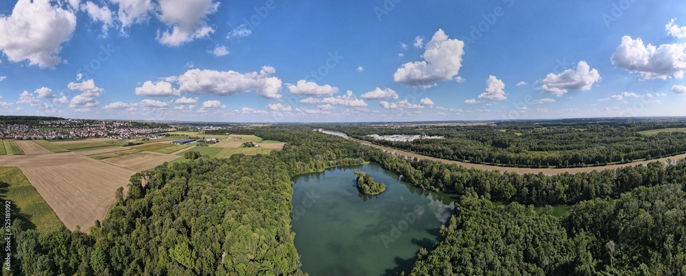 Beautiful nature landscapes with the lake Thalfinger in  the small town Neu-Ulm, Swabia, South Germany.  Beautiful nature landscapes next to the river Danube. Aerial view.	
