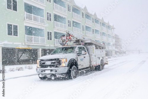electric company truck in snow