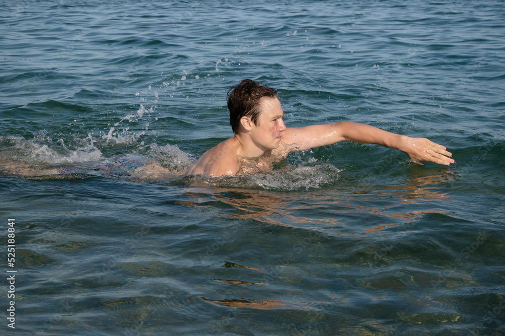 A 17 Year Old Teenage Boy Swiming