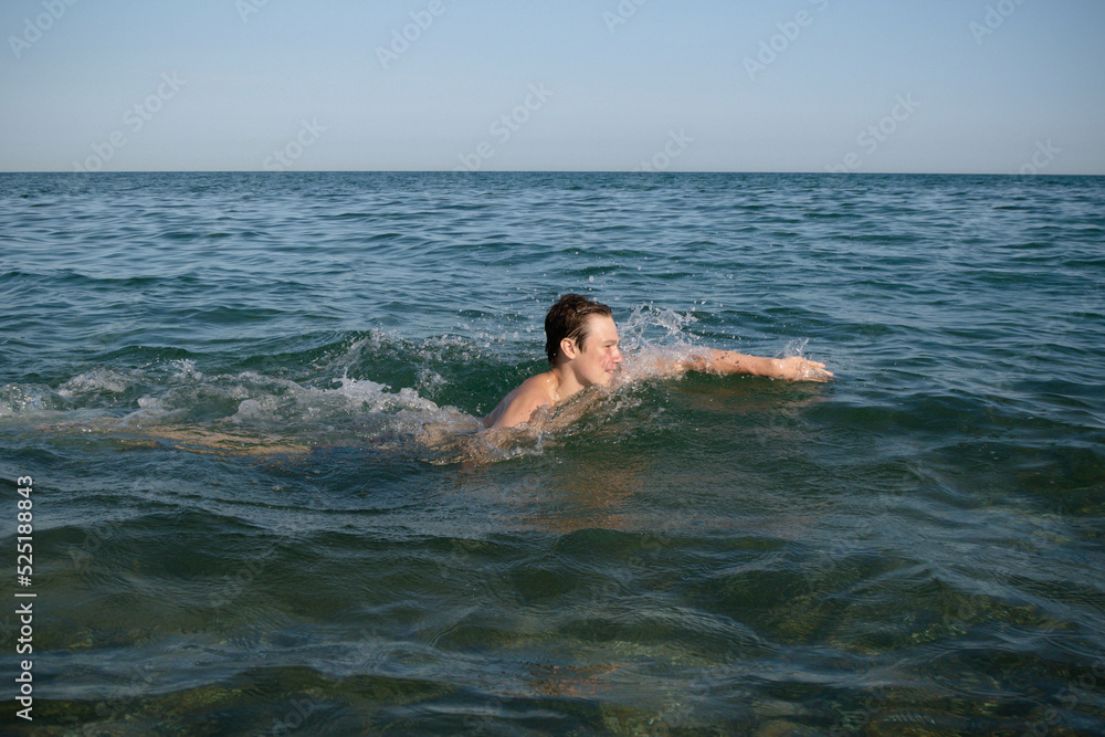 A 17 Year Old Teenage Boy Swiming