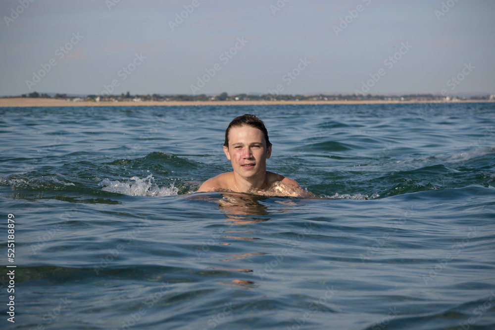 A 17 Year Old Teenage Boy Swiming