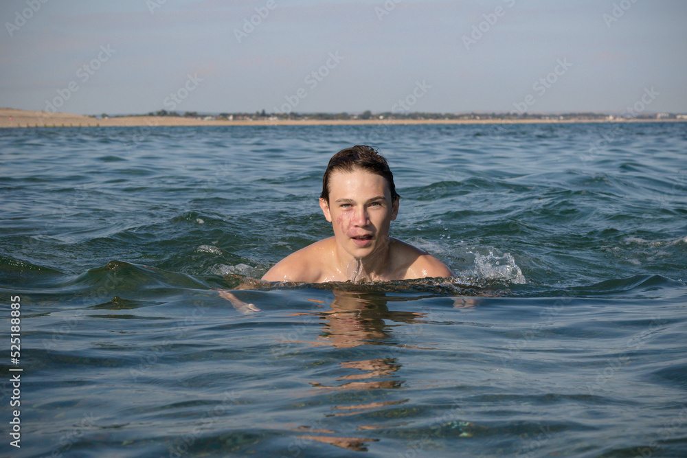 A 17 Year Old Teenage Boy Swiming