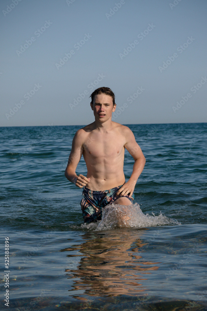Fototapeta premium A 17 Year Old Teenage Boy Walking