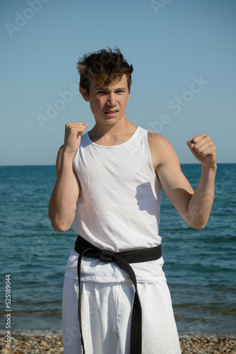 A 17 Year Old Teenage Black Belt photo