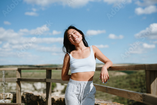 Young asian girl smiling and having fun in the forest  © Rubén