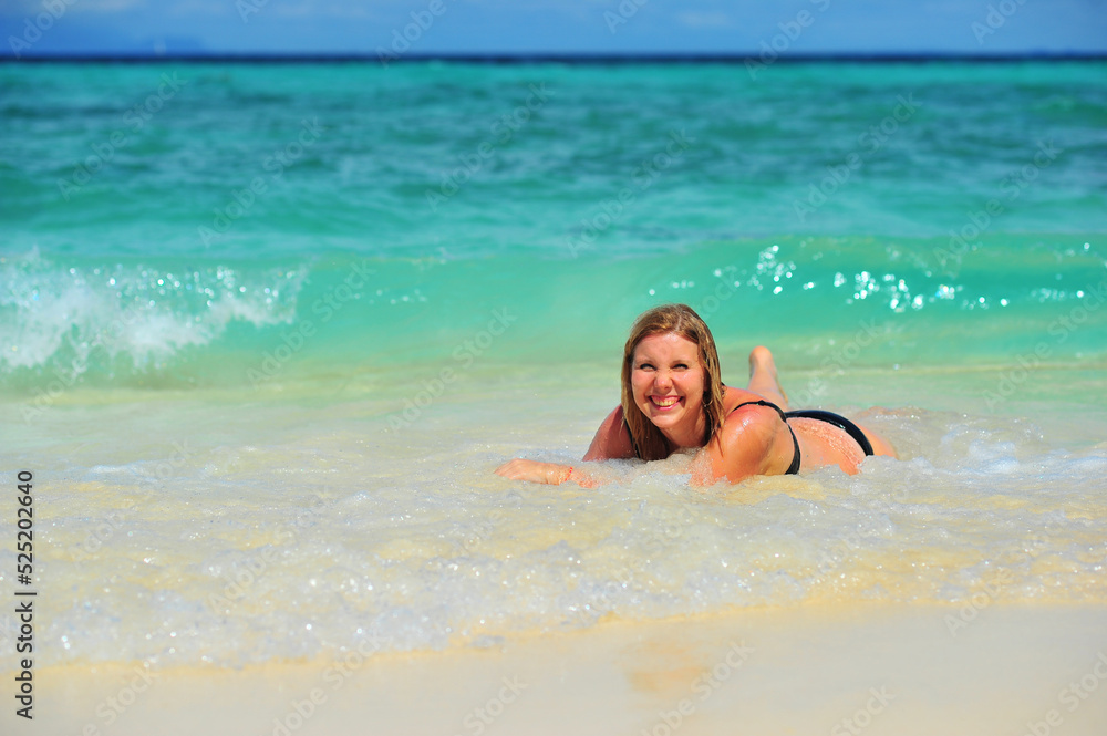  Beautiful Woman Hot Girl enjoying the Waves of the Ocean. Tropical vacation