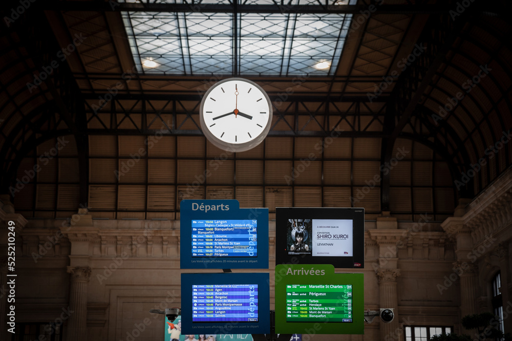 BORDEAUX, FRANCE - FEBRUARY 20, 2022: Selective blur on departures &  arrival boards in hall of Bordeaux