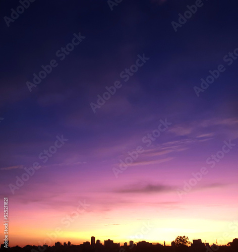 Beautiful sunny sky and clouds over the horizon. Sunset background. 