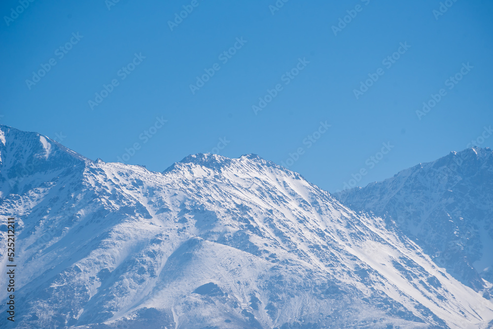 snow-capped mountain on a sunny afternoon