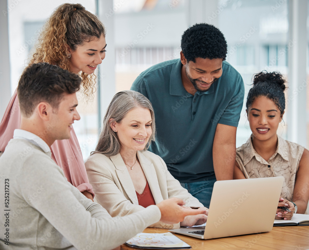 Teamwork, togetherness and unity with a team of colleagues and female leader, boss or manager working on a laptop during a boardroom meeting in the office. Planning, discussing and talking strategy