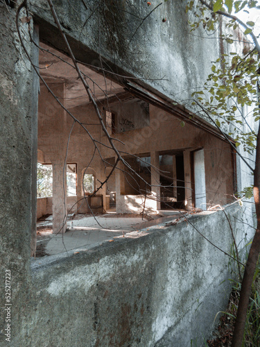 Gray abandoned house in nowhere photo