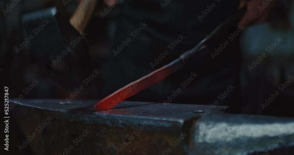 professional blacksmith shaping future knife by hammer and anvil in forge, closeup view, 4K, Prores professional blacksmith shaping future knife by hammer and anvil in forge, closeup view, 4K, Prores