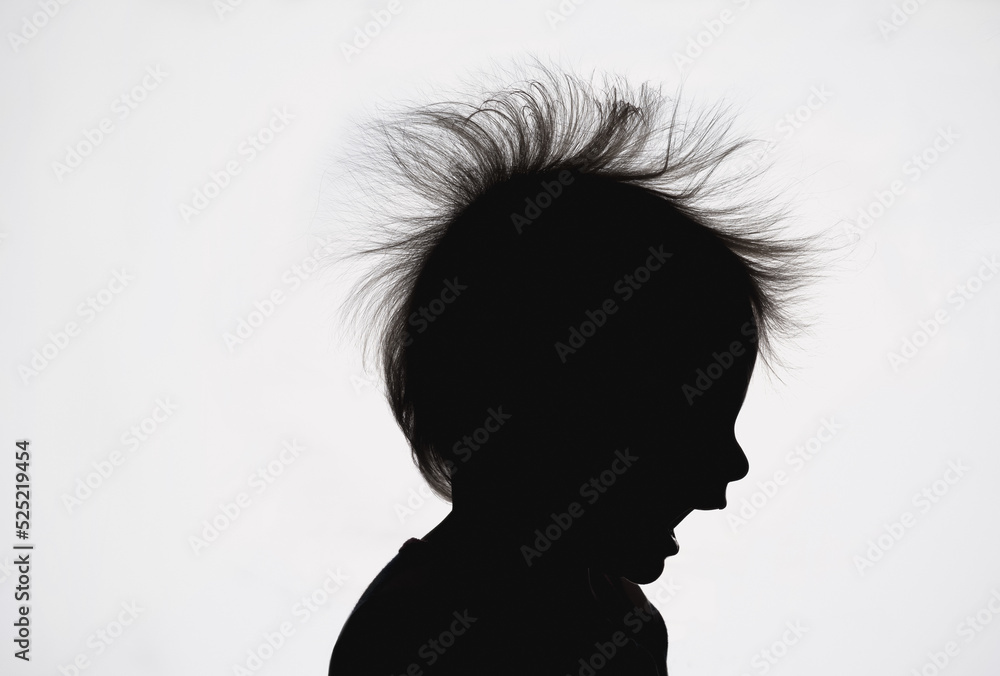 silhouette of child with crazy hair silhouette of child with crazy hair