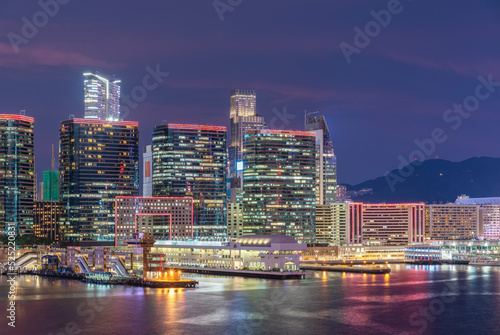 High rise office building and pier in Hong Kong city at dusk © leeyiutung