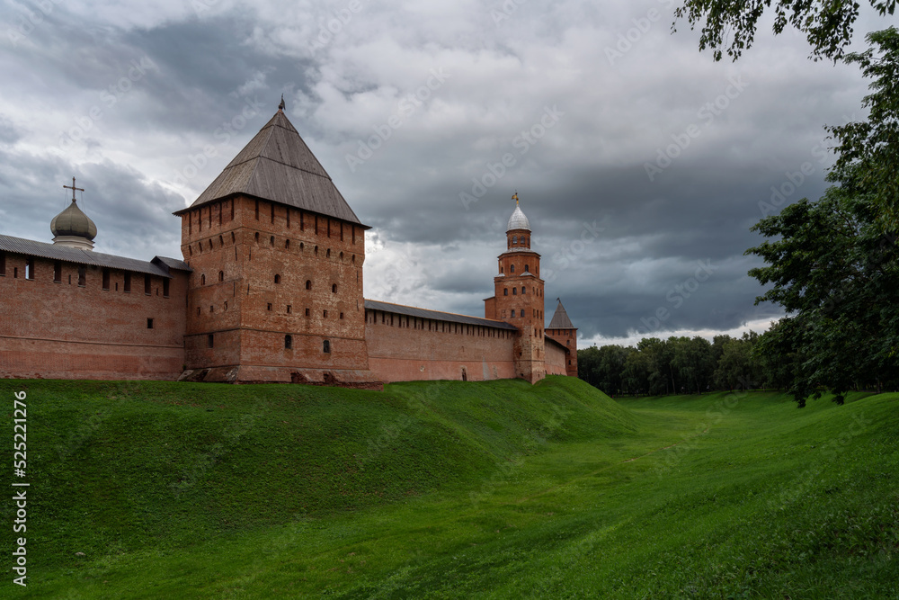 View of the wall of the Novgorod Kremlin, Knyazhnaya Tower, Kokouy Tower, Pokrovskaya Tower on a summer day, Veliky Novgorod, Russia