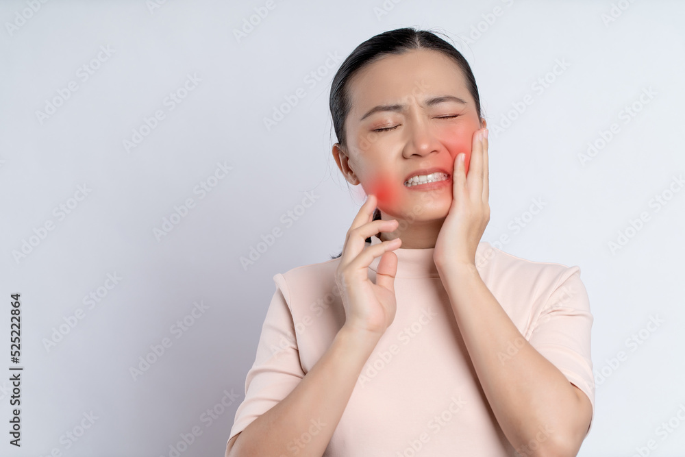Asian woman was sick with toothache standing isolated on white background. Asian woman was sick with toothache standing isolated on white background.