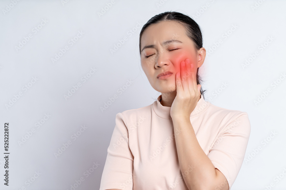 Asian woman was sick with toothache standing isolated on white background. Asian woman was sick with toothache standing isolated on white background.