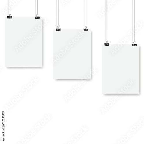 Blank posters hanging on a binder clips. A4 white paper sheet hangs on a rope with clips. Vector